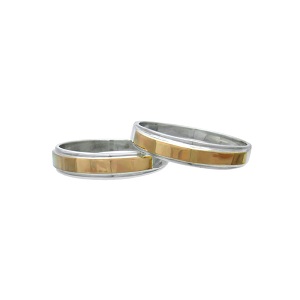 Серебряные обручальные кольца с золотыми вставками пара.